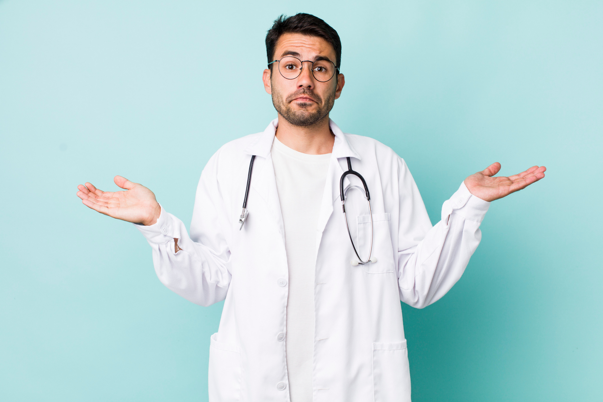 A doctor shrugging his shoulders wondering what is e-invoicing and e-statement.