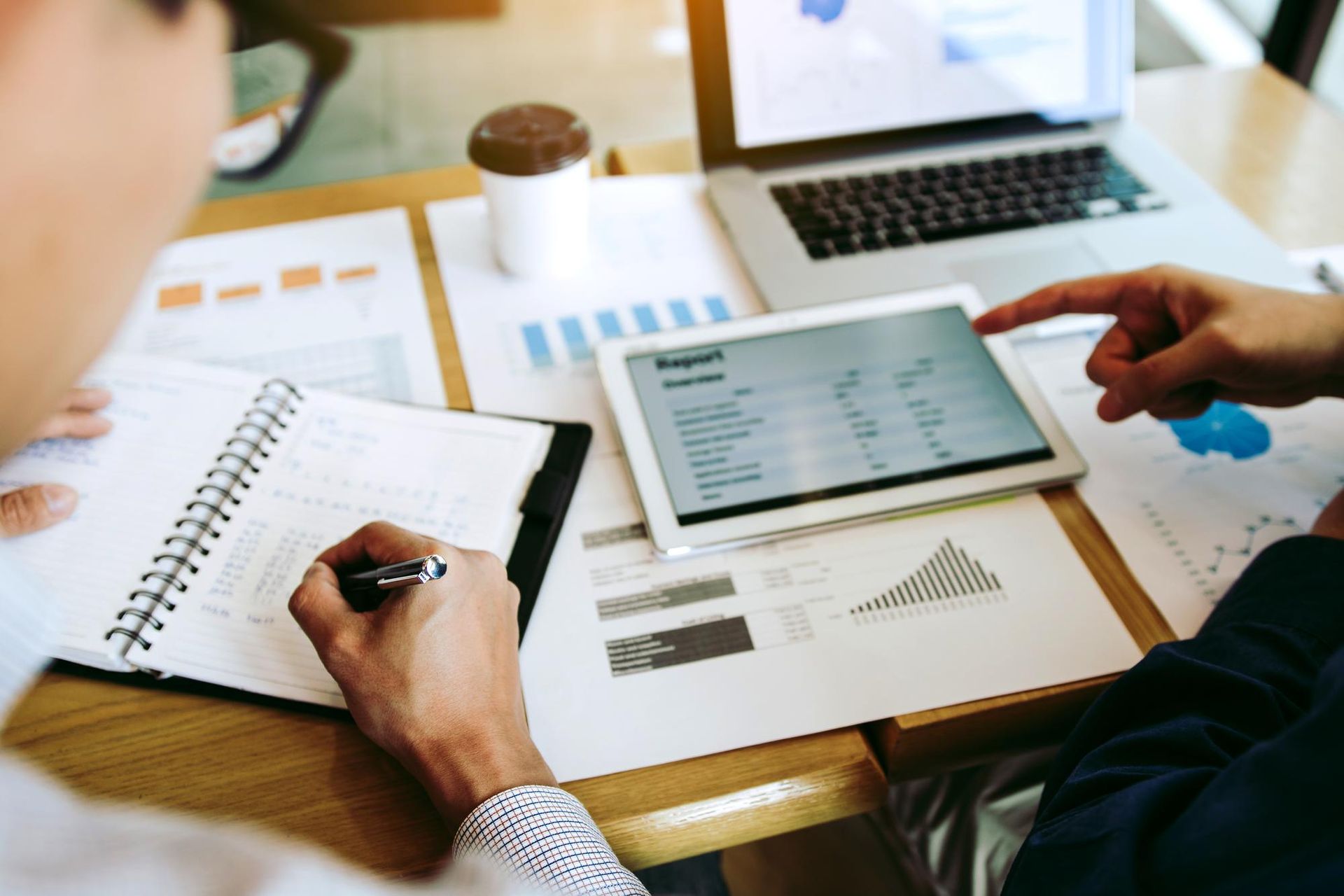 Healthcare administrators comparing AltaPoint and billrMD dashboards while reviewing modern billing 