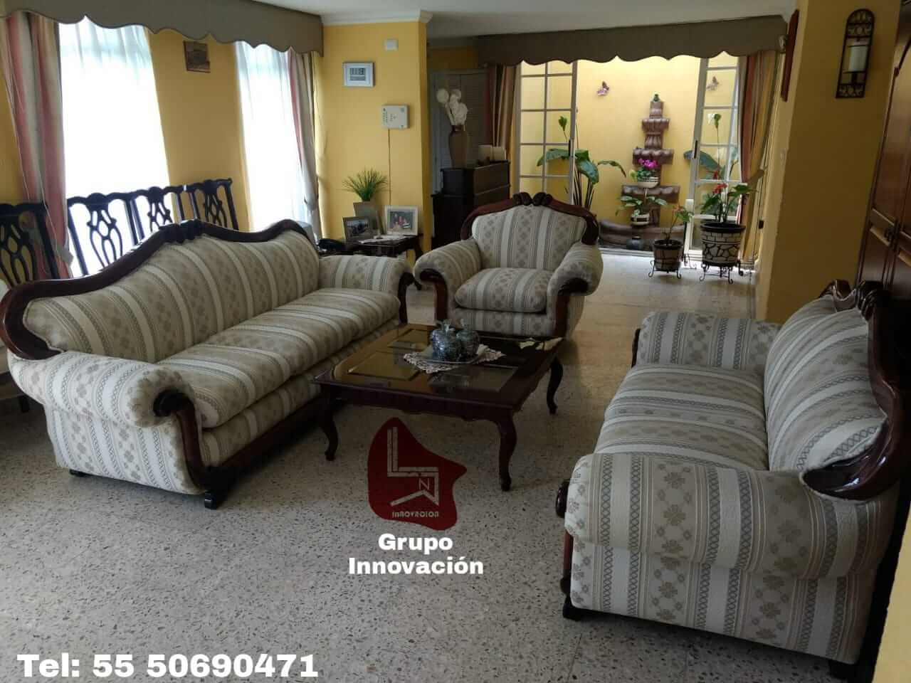 Sala renovada por TAPICERÍA E INNOVACIÓN GARRIDO