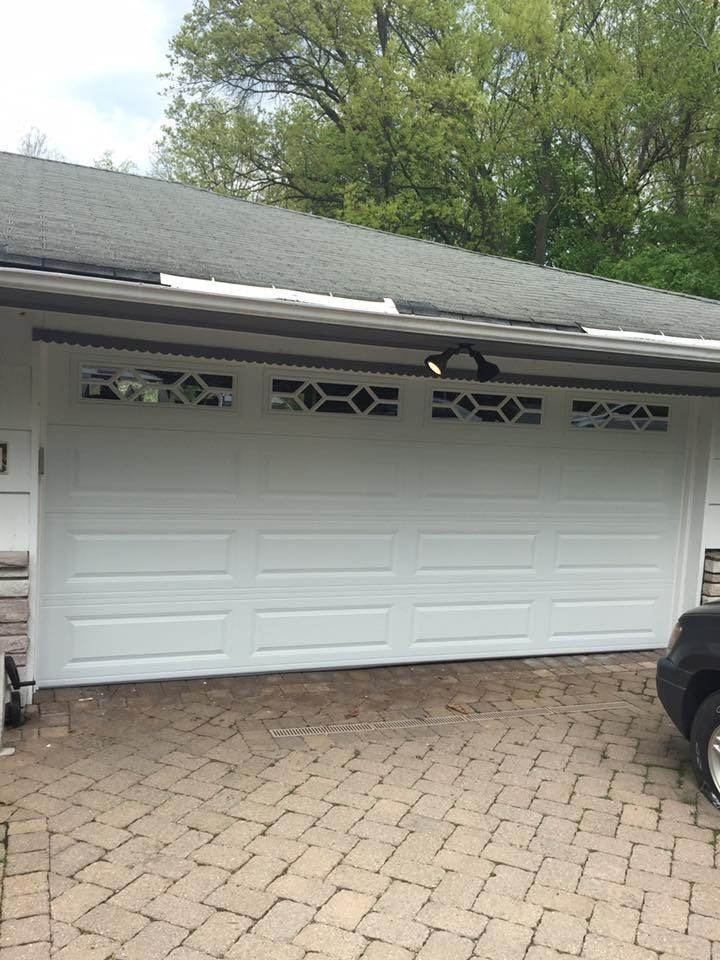 Sectional Garage Door Featuring Modern Windows