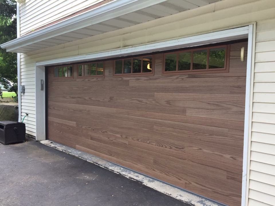 Natural Wood-Paneled Garage Door