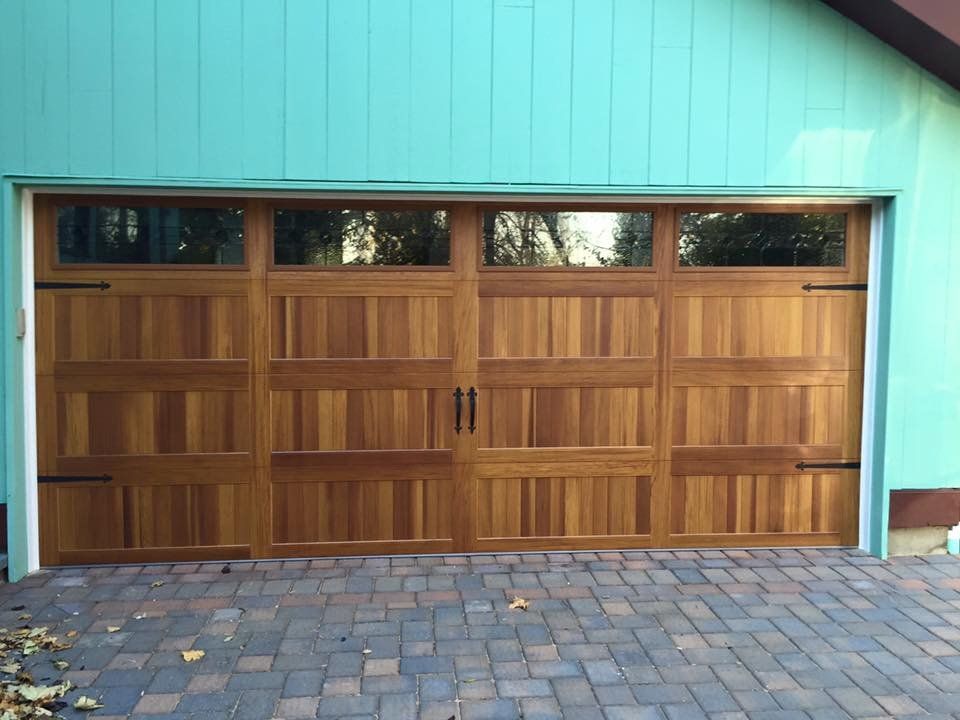 Classic Garage Door Featuring Black Handles