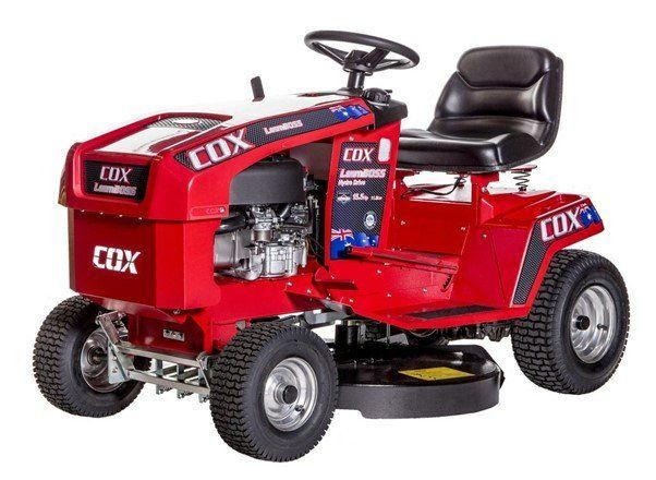 A Red Cox Lawn Mower With a Black Seat — Coffs Chainsaw and Mower in Coffs Harbour, NSW