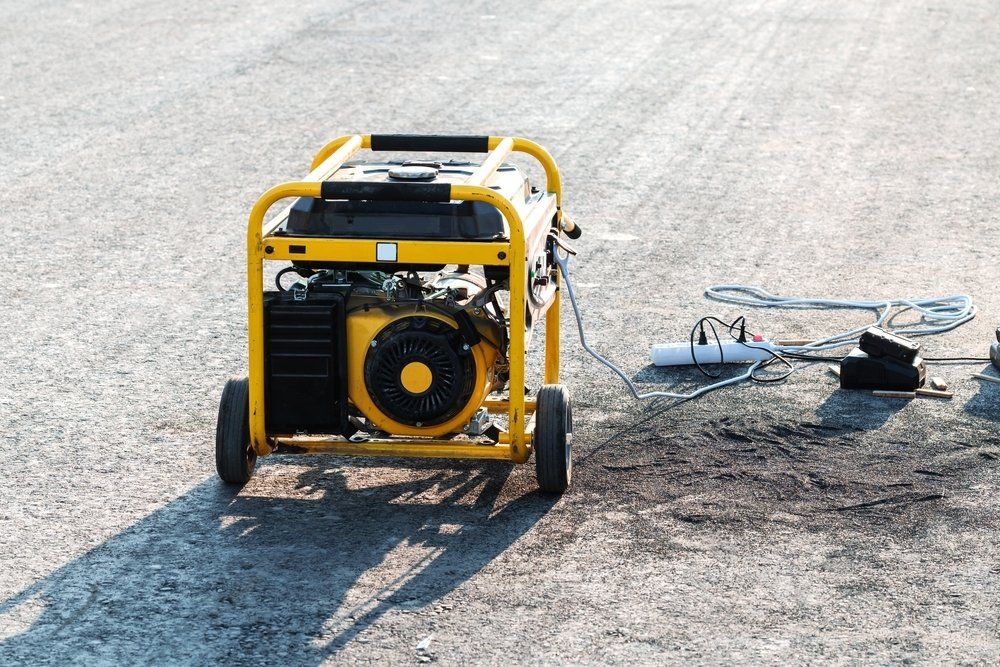 Yellow Portable Generator In Use — Coffs Chainsaw and Mower in Macksville, NSW