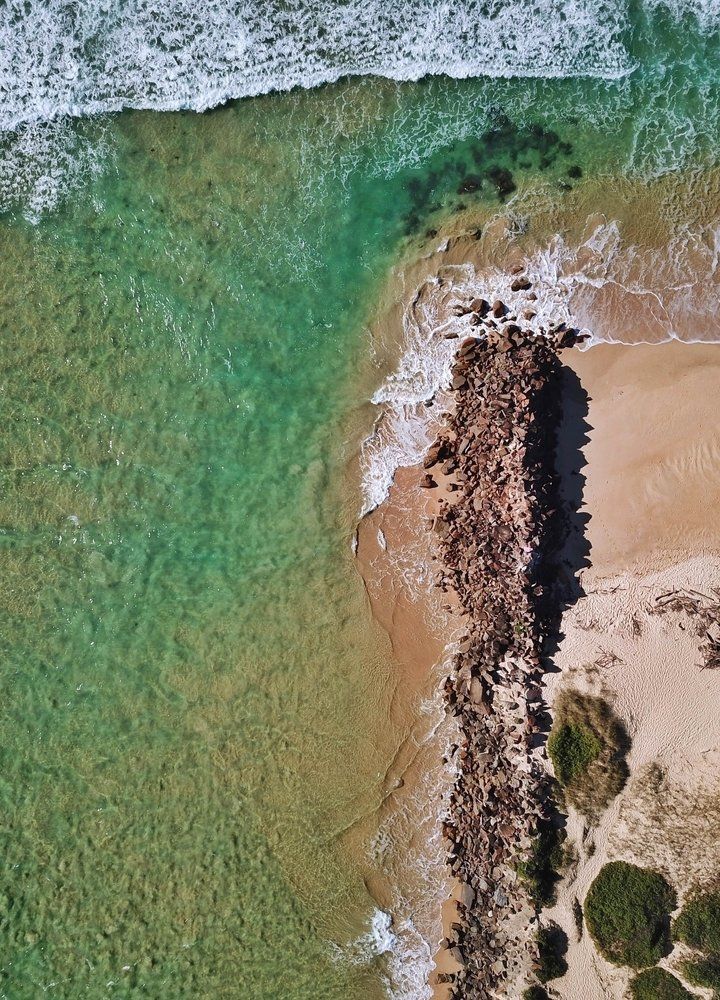 An Aerial View Of A Shore In Urunga — Coffs Chainsaw and Mower in Urunga, NSW