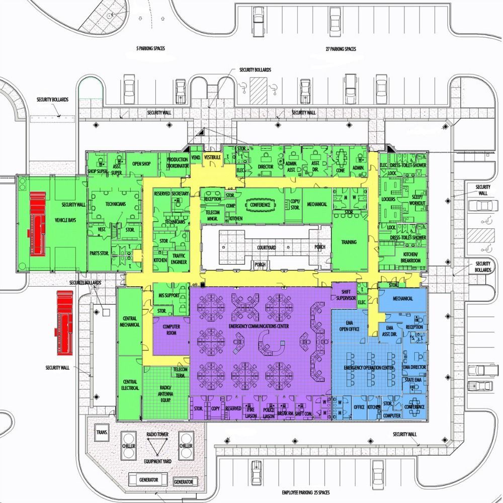 Floor plan of a building, color-coded with various rooms. Parking and courtyard areas are also visible.