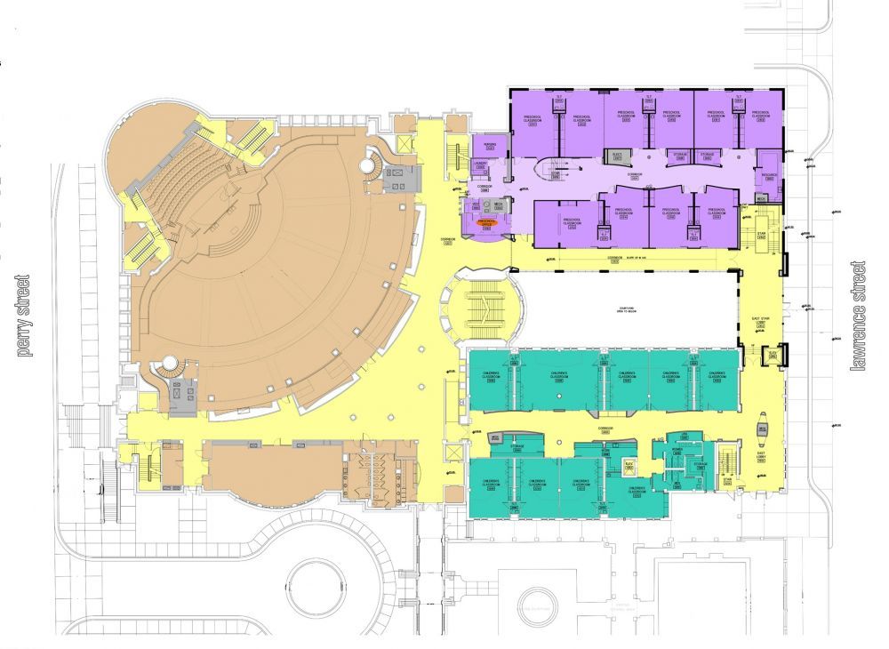 Floor plan of a building, sections colored yellow, brown, green, and purple. Streets labeled.