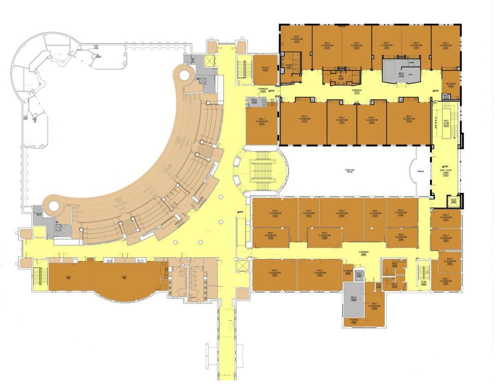 Floor plan of a building; yellow hallways, brown rooms, and other structural elements.