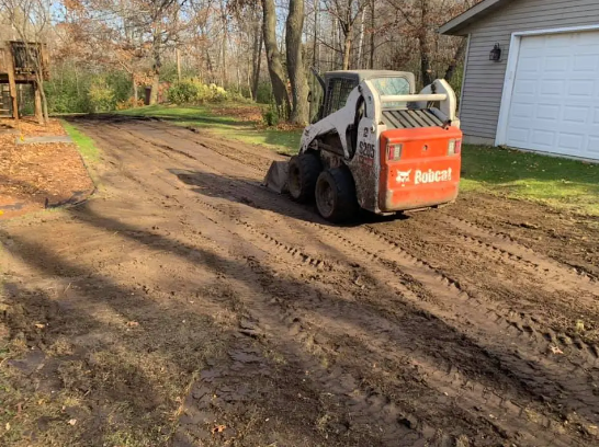 RC Landscapes utilizing heavy machinery for landscape grading.