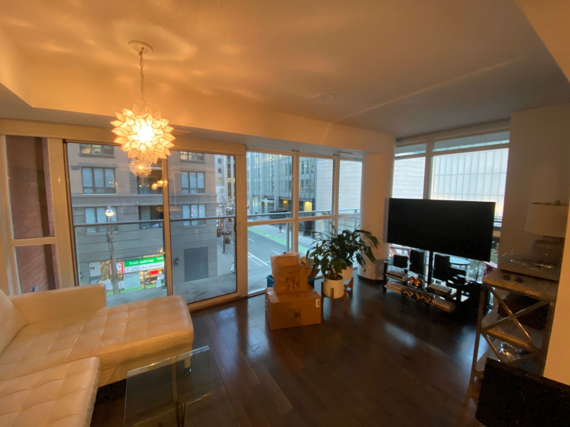 A living room with a couch and a flat screen tv