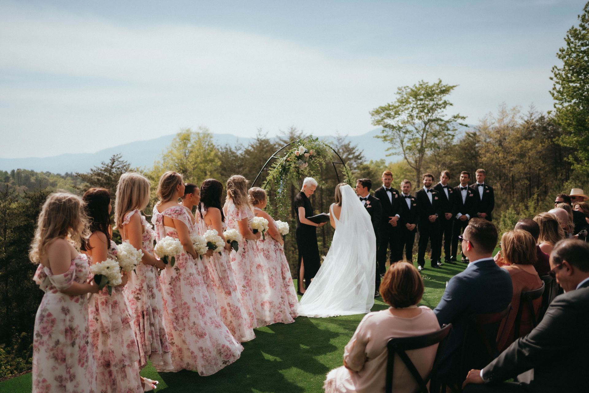 Outdoor wedding ceremony surrounded by mountain scenery at North Carolina wedding venue