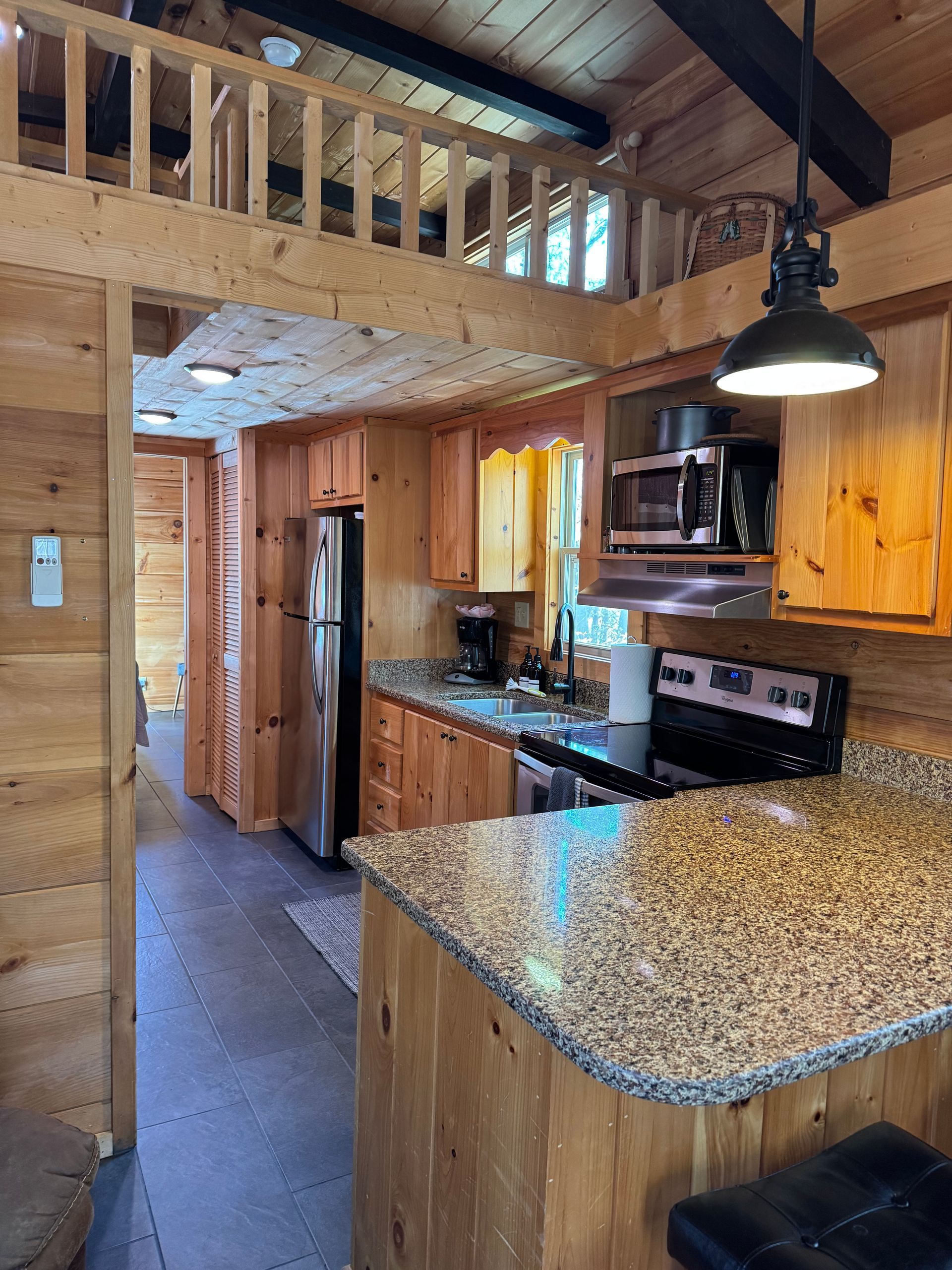 Kitchen inside Cabin F at Serenity Ridge for wedding guest lodging