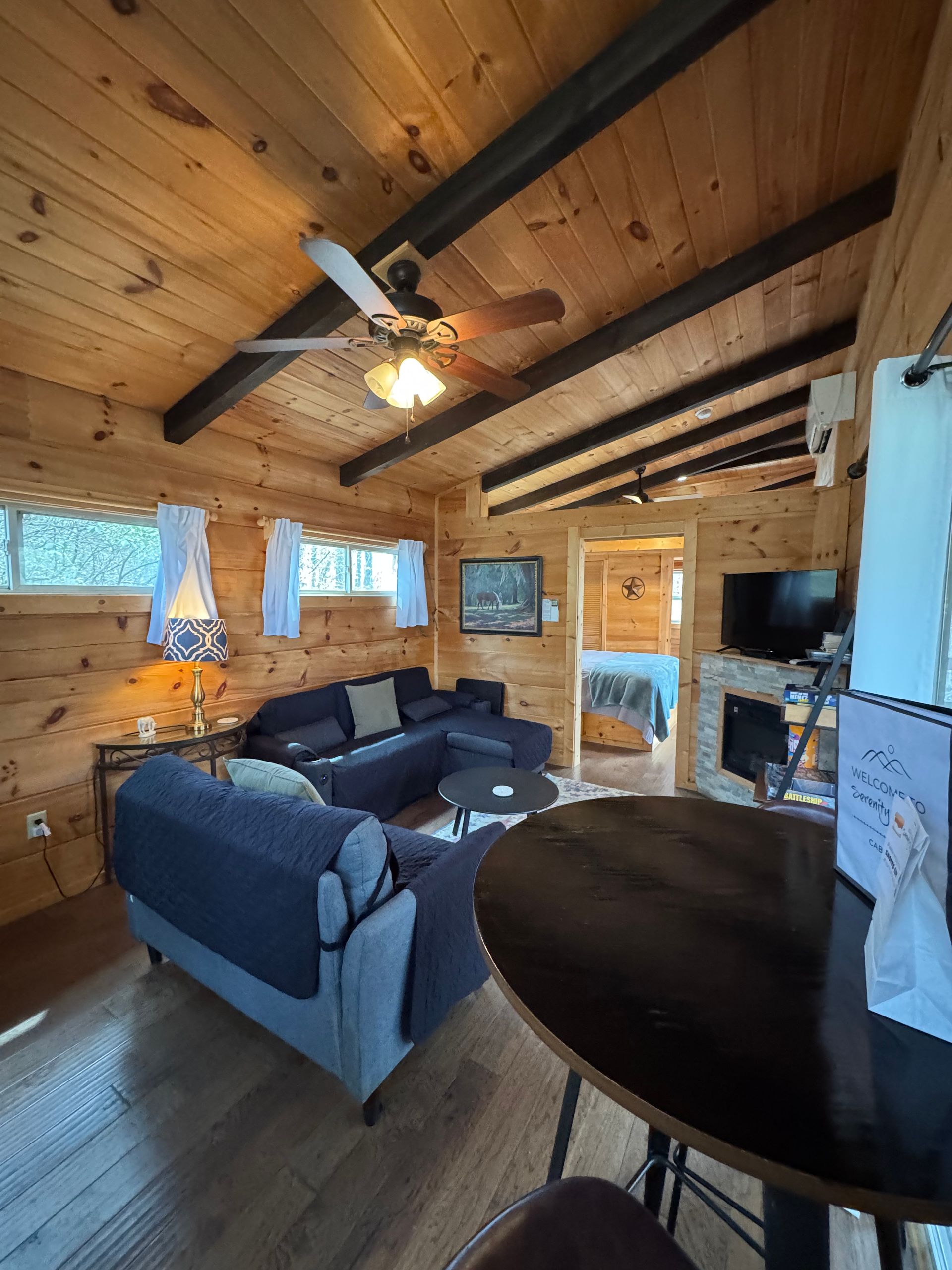 High-top dining table for two in Cabin E living space at Serenity Ridge
