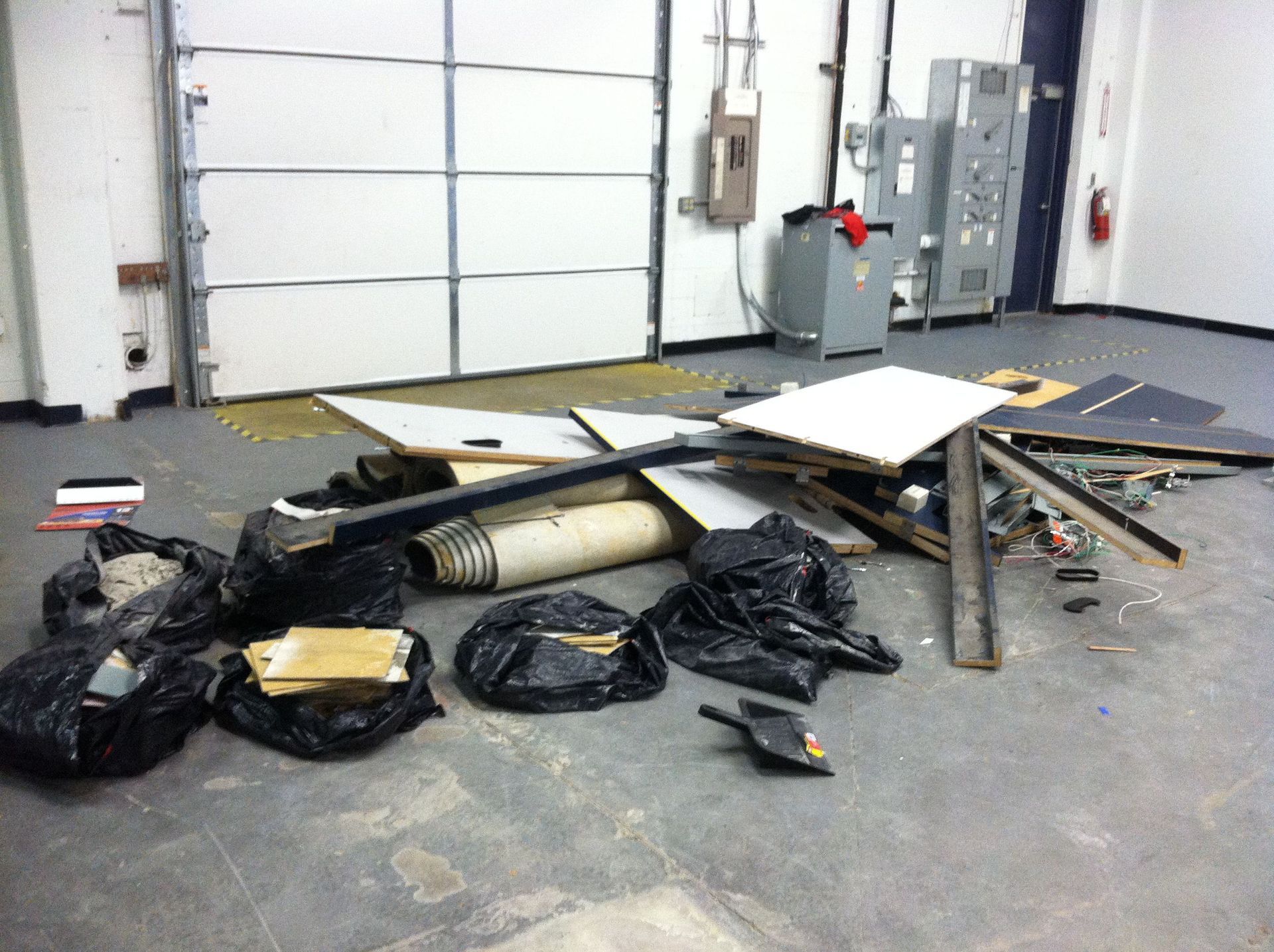 A room with a lot of trash on the floor