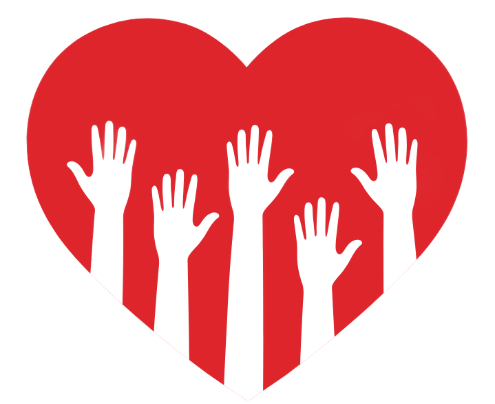 A woman and child are sitting at a table holding paper hearts