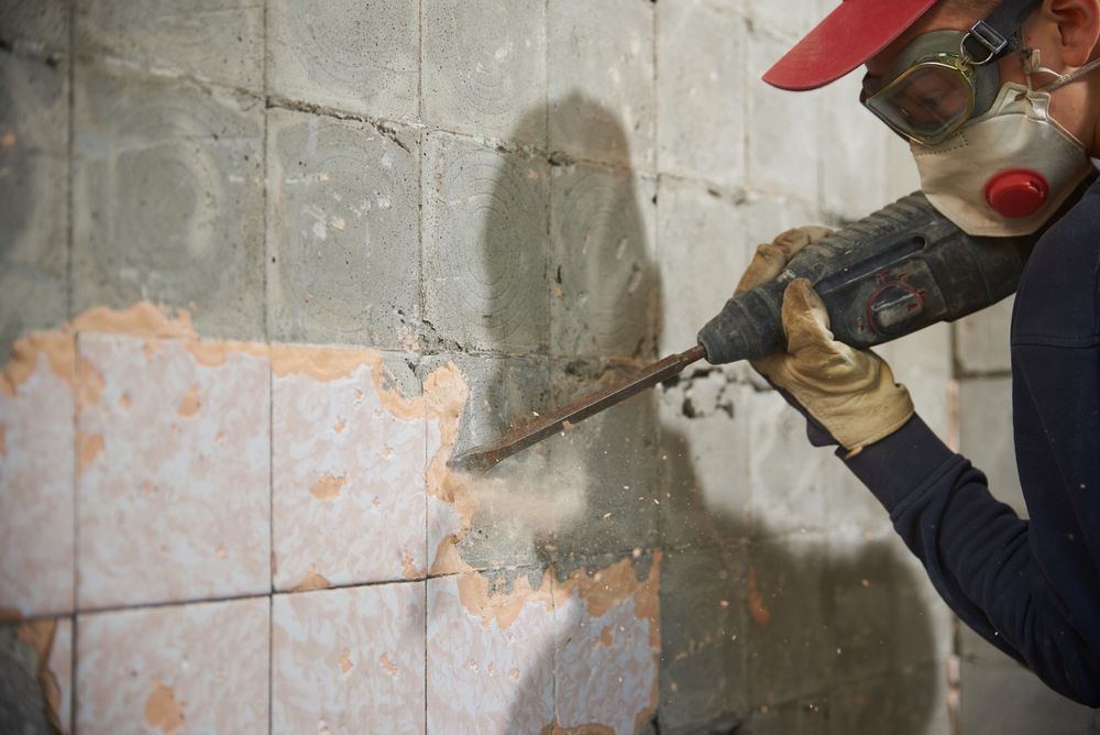 White Dump Truck Parked on A Wet Driveway a House — Heller Excavation & Tree Services in Mullumbimby, NSW