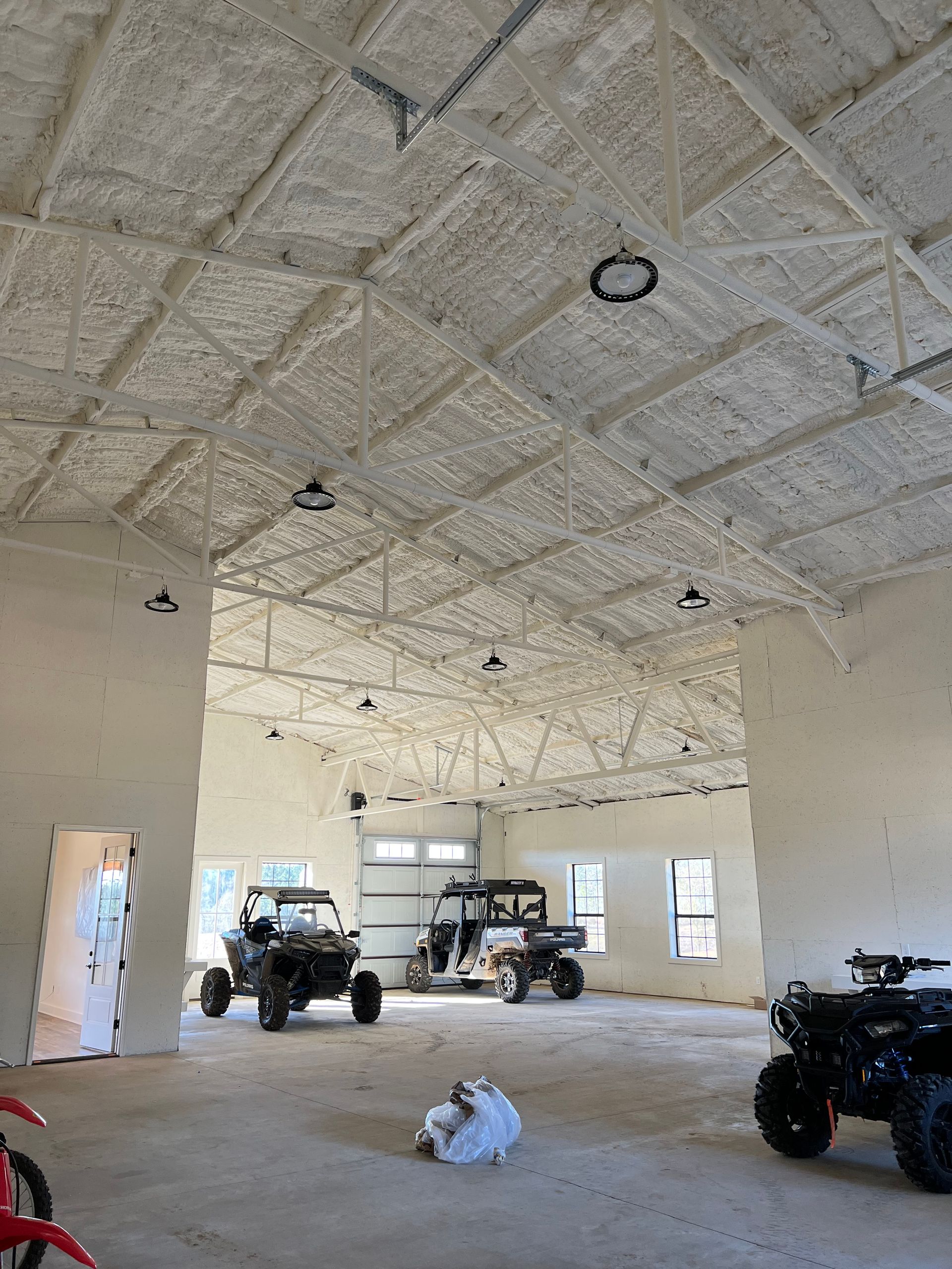 Garage for ATV, UTV equipment painted by Covington Painter Tchefuncte subdivision in Covington, La.