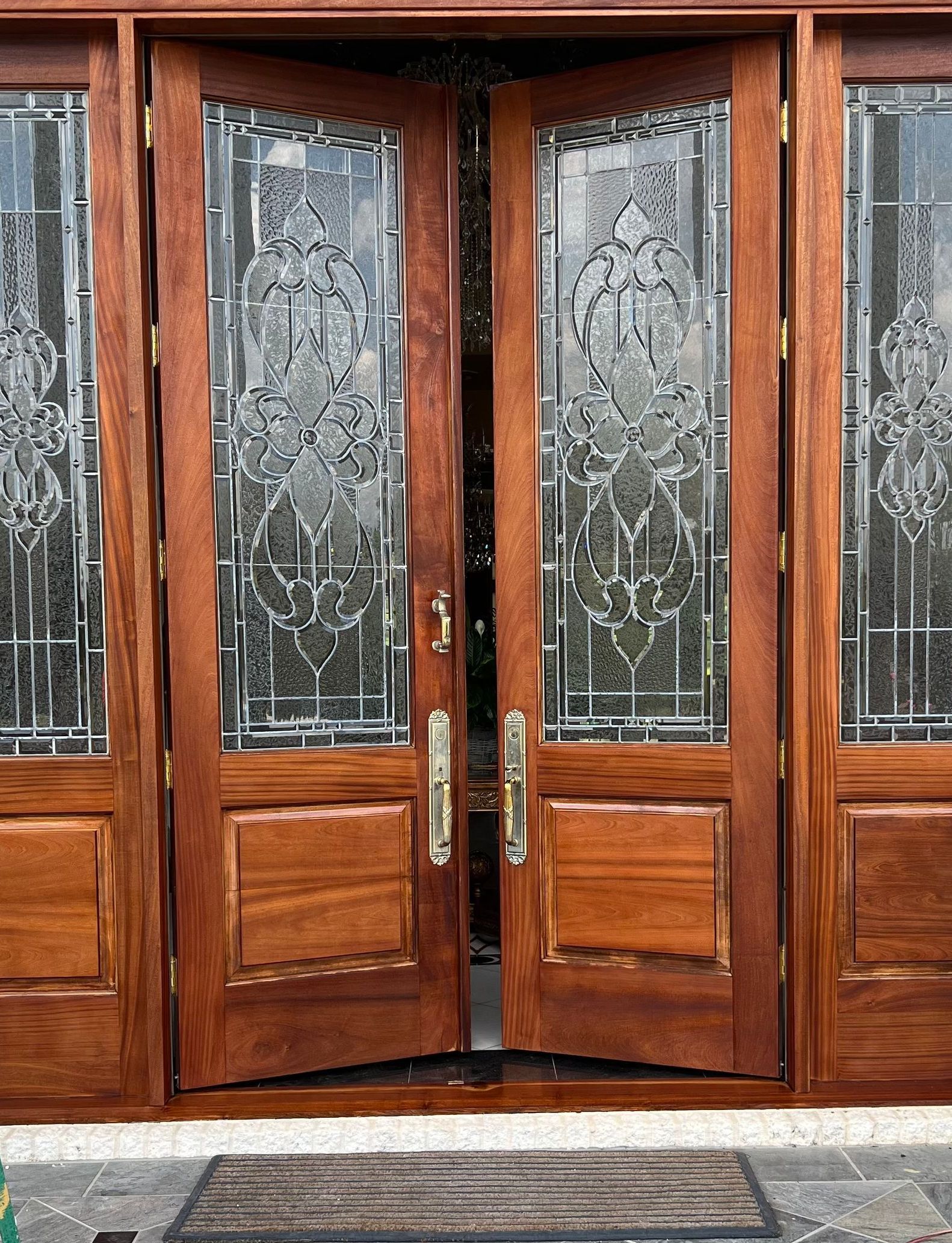 walnut stained front doors make a statement