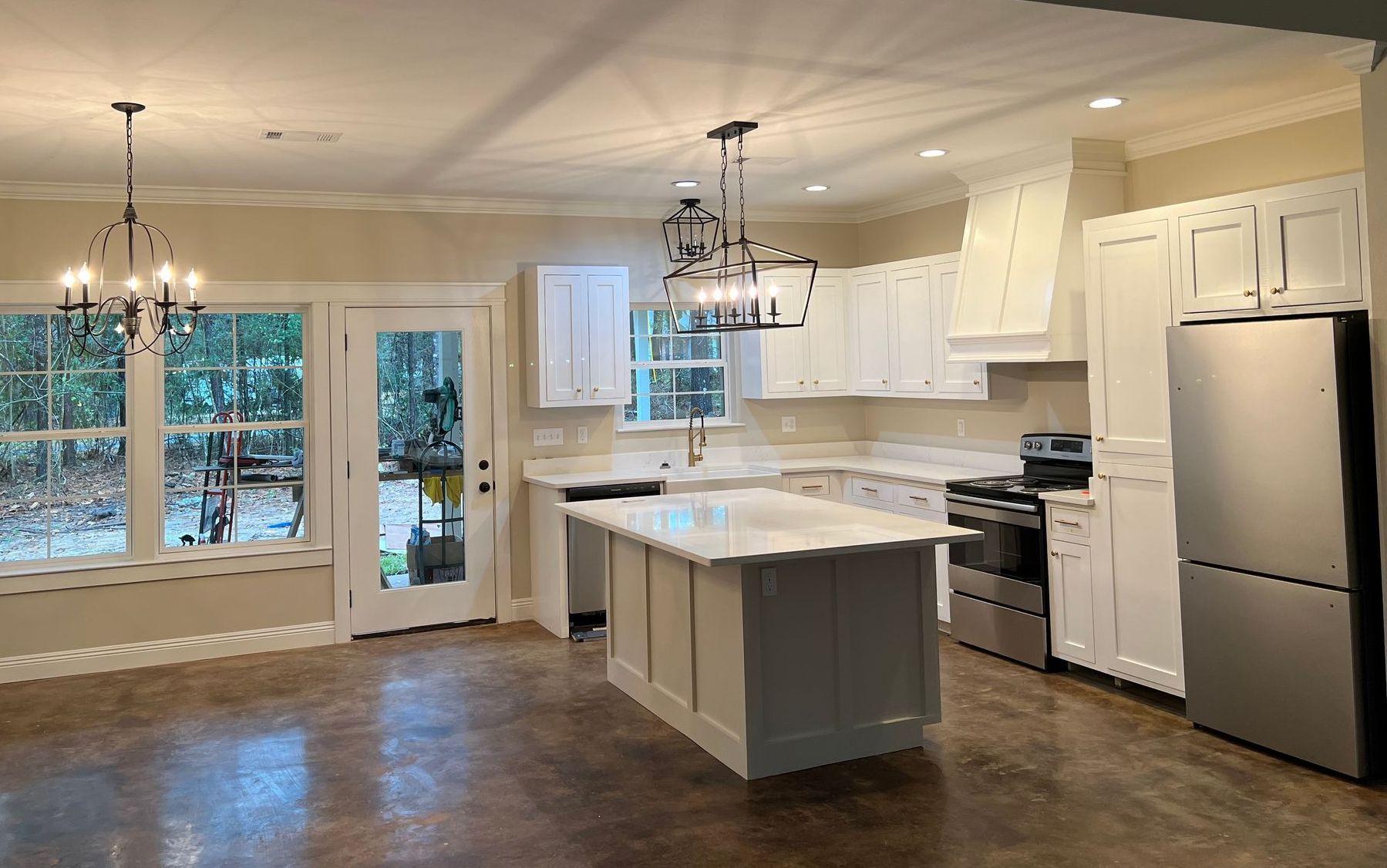 cabinets and island painted in new construction house