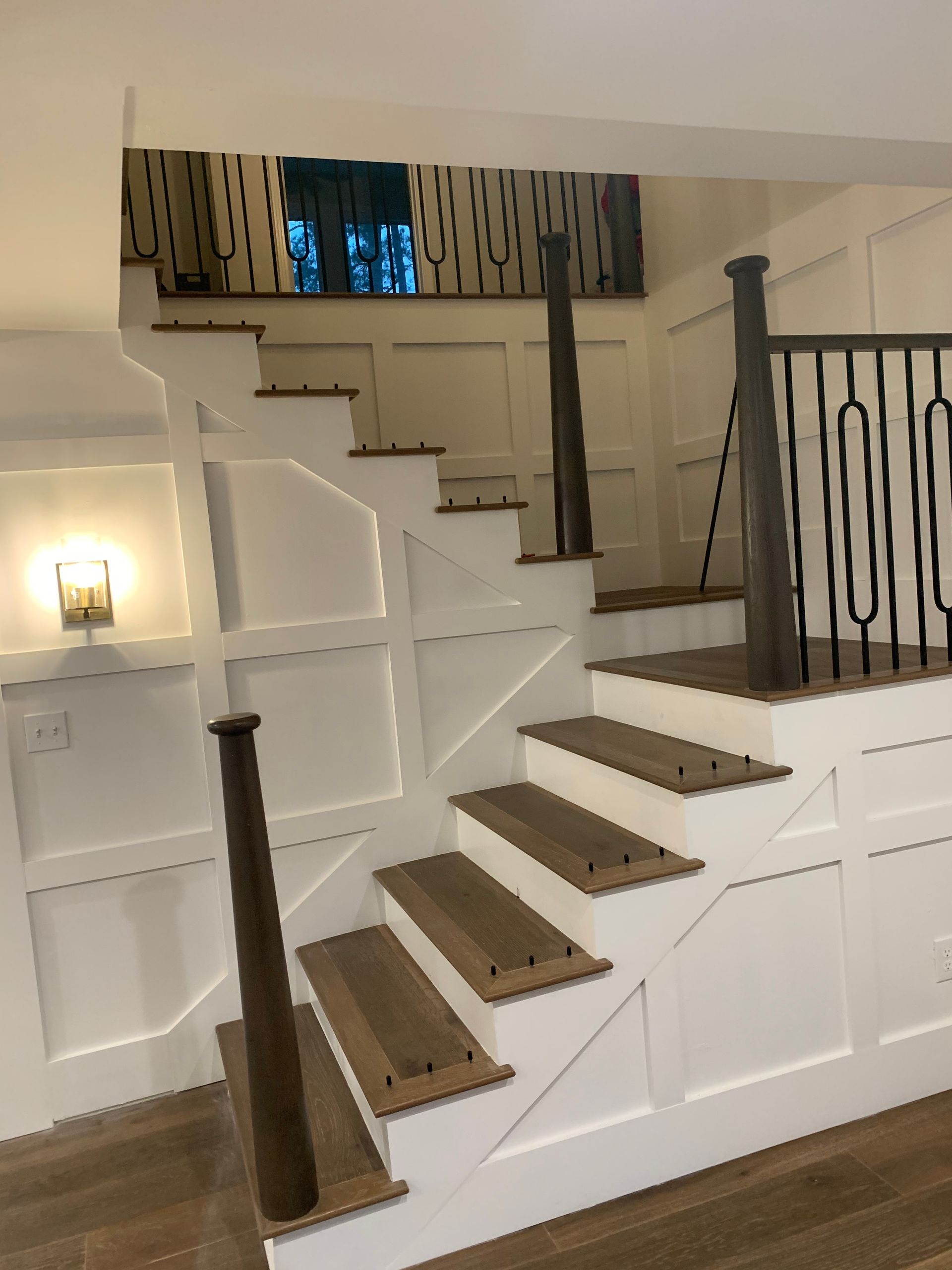 Custom stairs, painted white with stained walnut treads