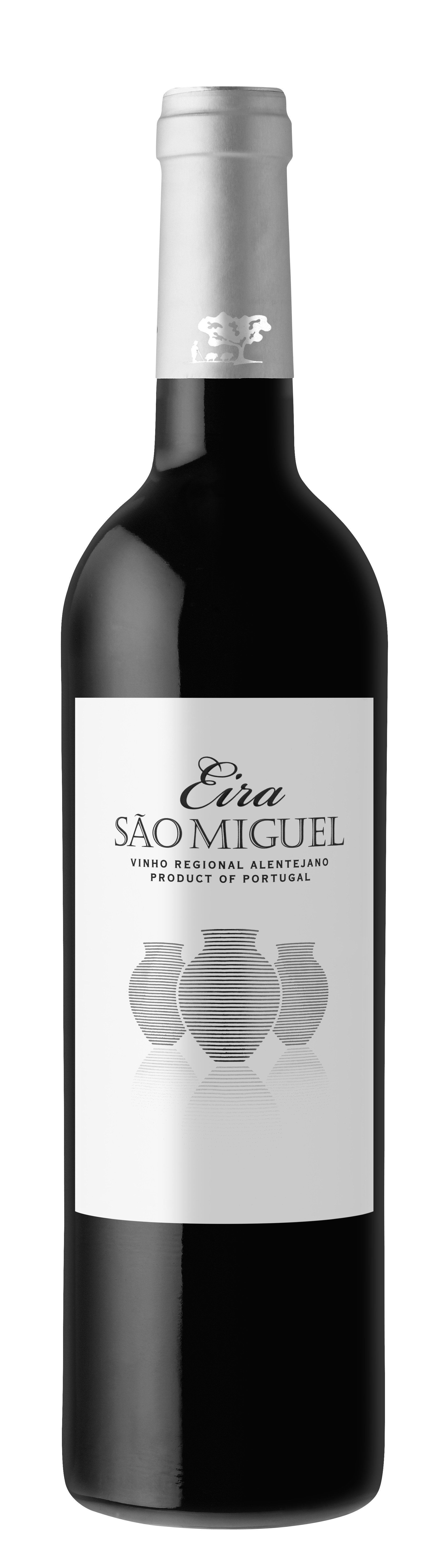 Wine bottle with a white label; label has text and a design.