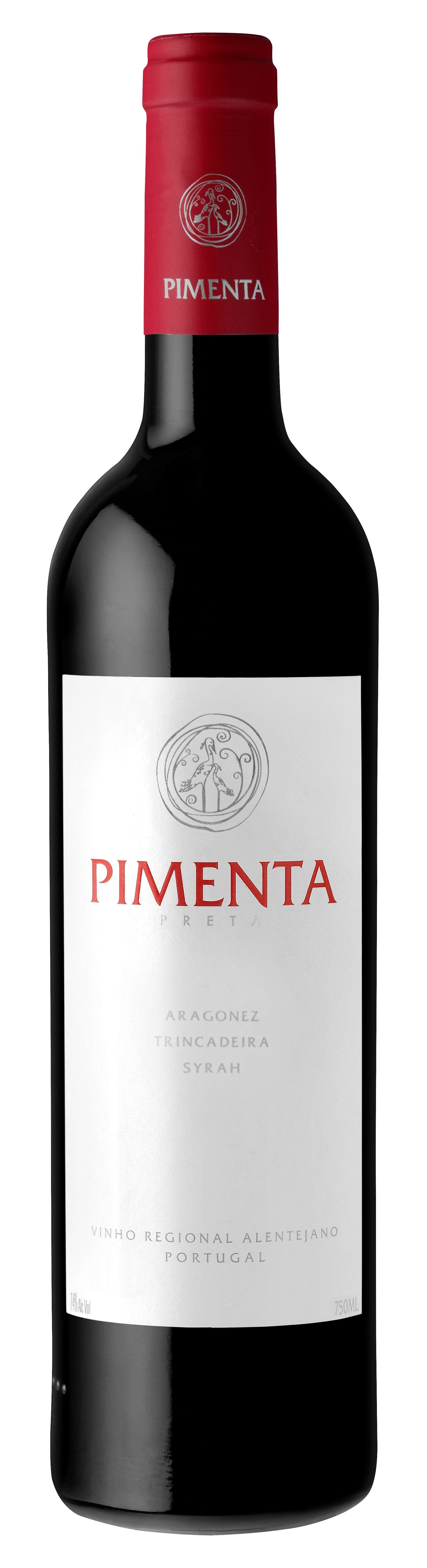 Bottle of red wine with a red top and white label, with the word
