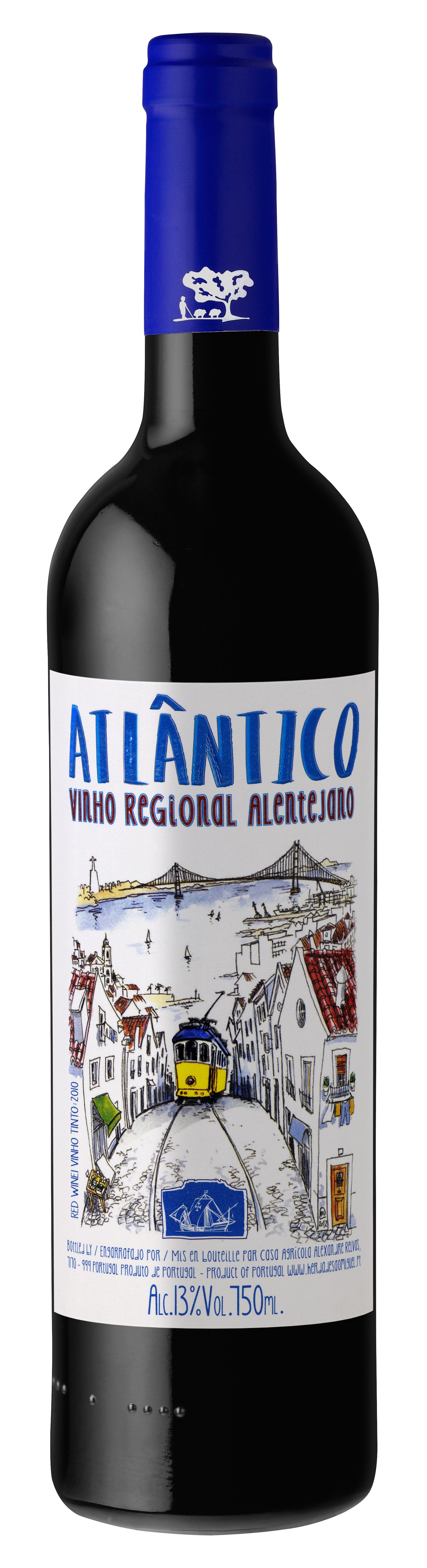 Bottle of Atlântico red wine, with a blue cap and a label depicting a coastal scene in white, blue, and brown.