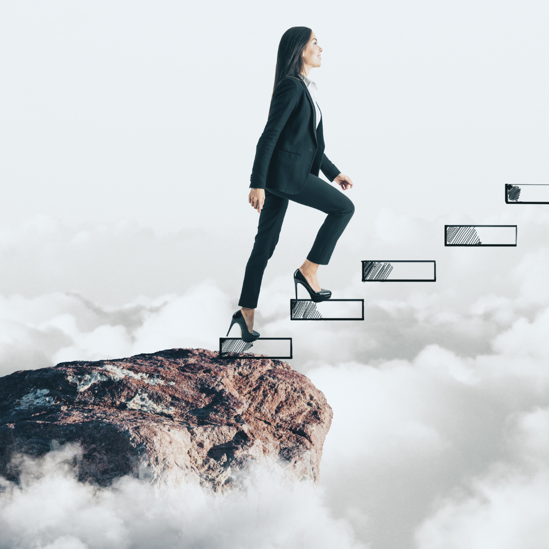 woman walking up the stairs towards a goal