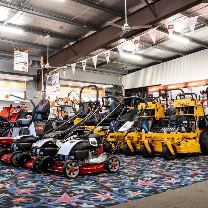 Lawn Mowers Displayed In A Store, Featuring Various Models — Whitsunday Mowers In Airlie Beach, QLD