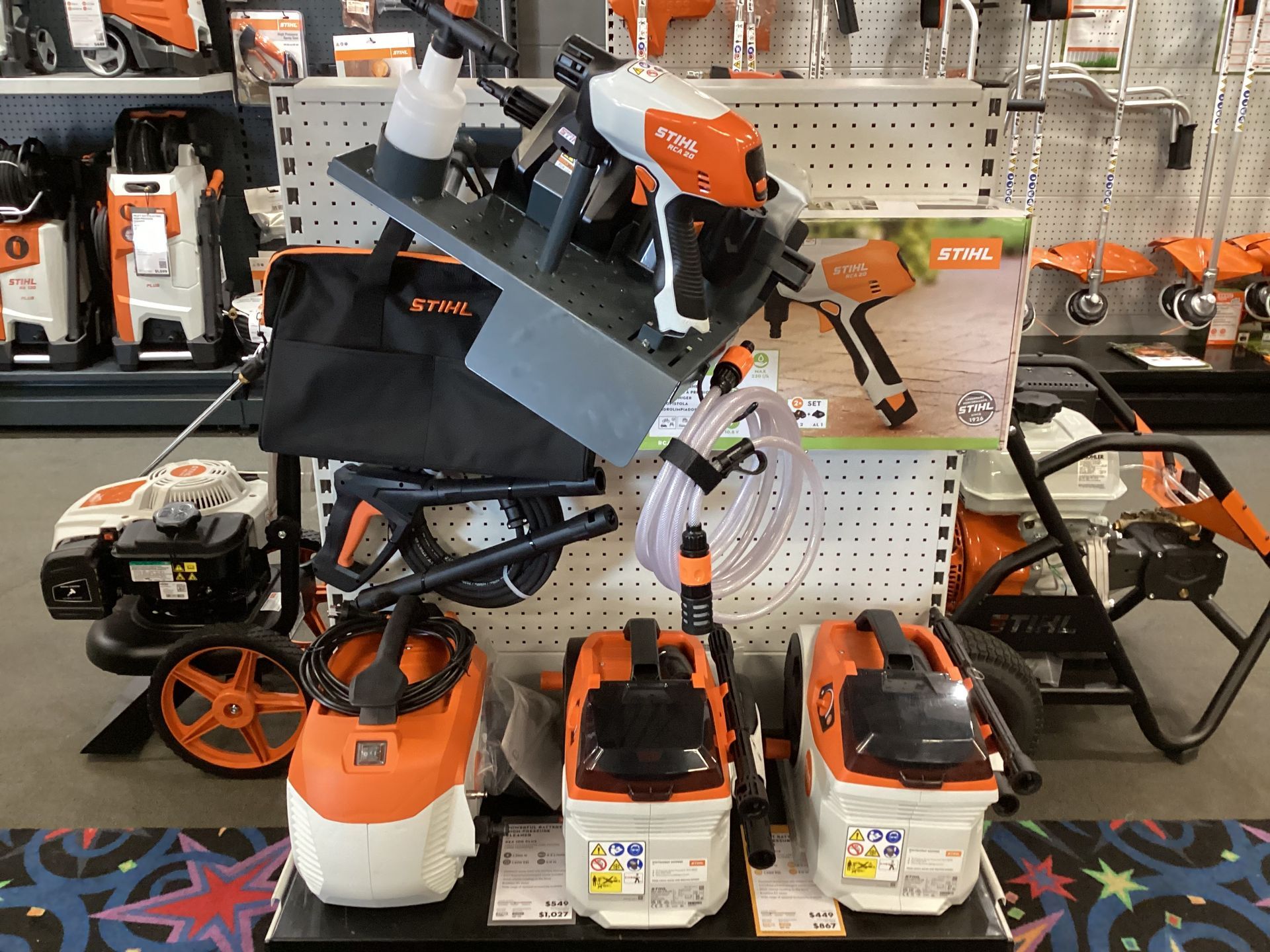 A Row Of Lawn Mowers Are Lined Up In A Store — Whitsunday Mowers In Proserpine, QLD