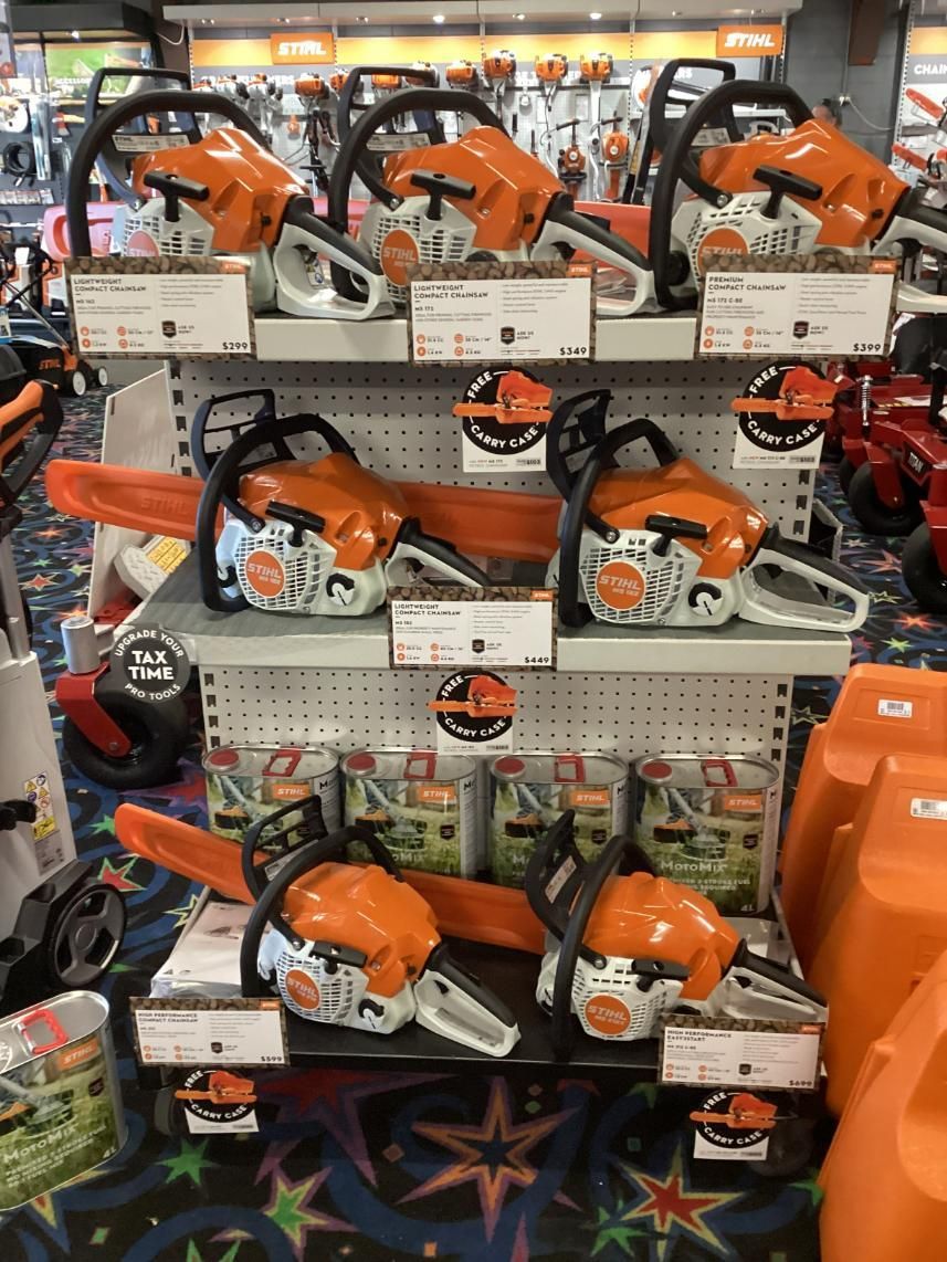 A Display Of Toy Chainsaws In A Store — Whitsunday Mowers In Proserpine, QLD