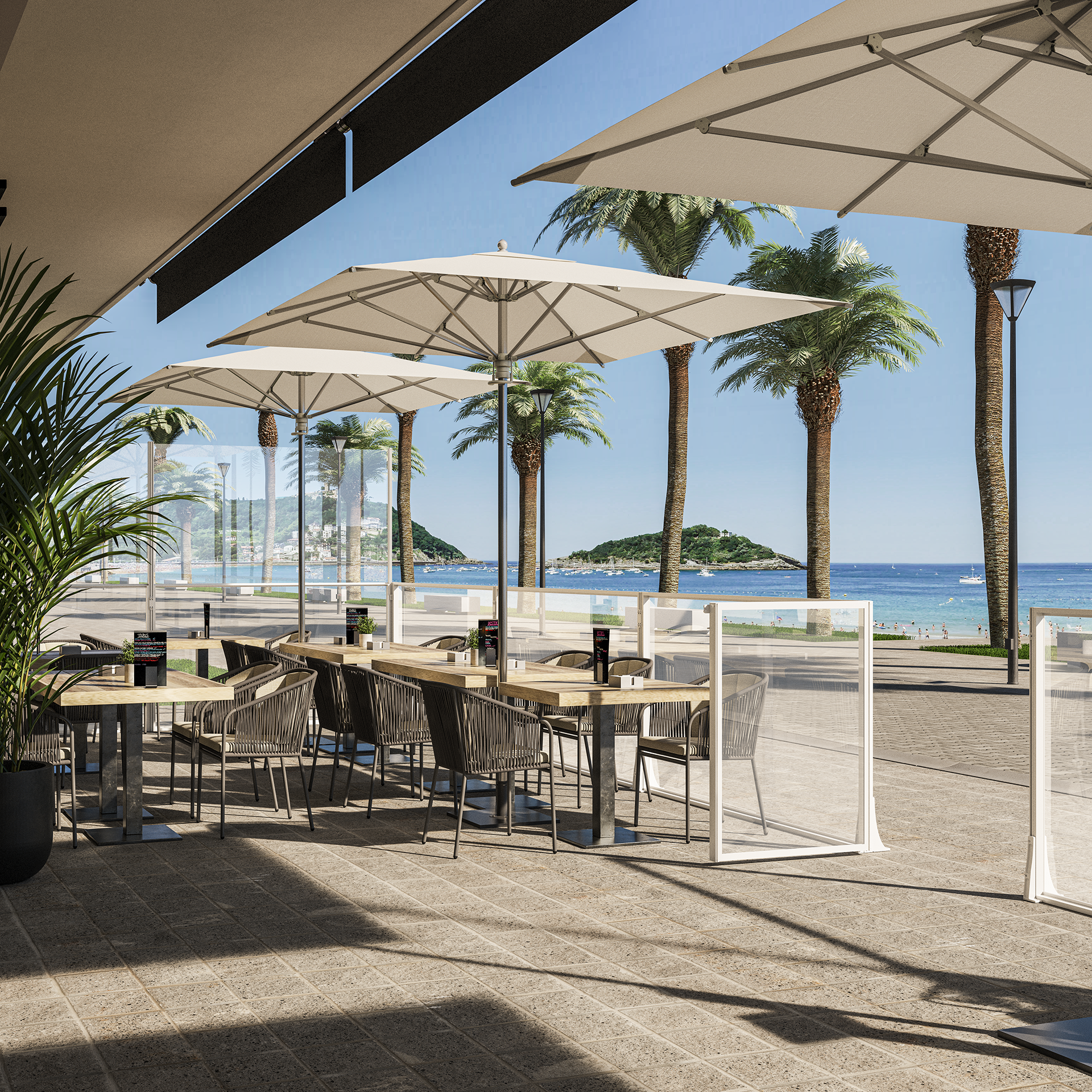 Un moderno ampliamento di un edificio con pareti in vetro, pilastri in mattoni, pavimento piastrellato e posti a sedere all'aperto.