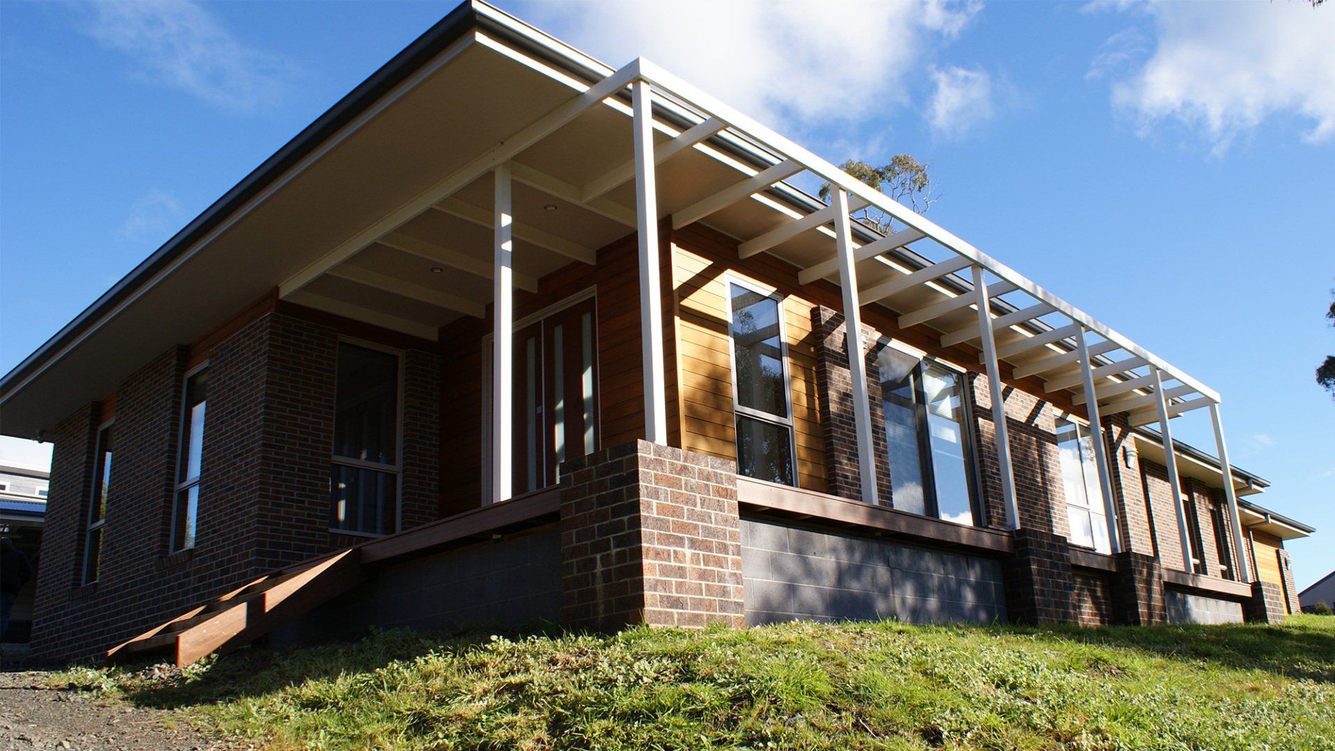 Completed LD house on sunny day