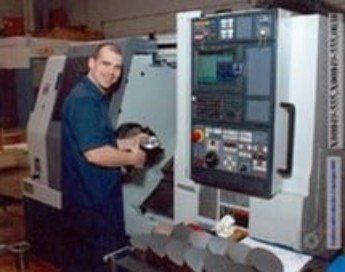 Worker smiling for the Picture — Propeller Manufacturing in Clinton Township, MI