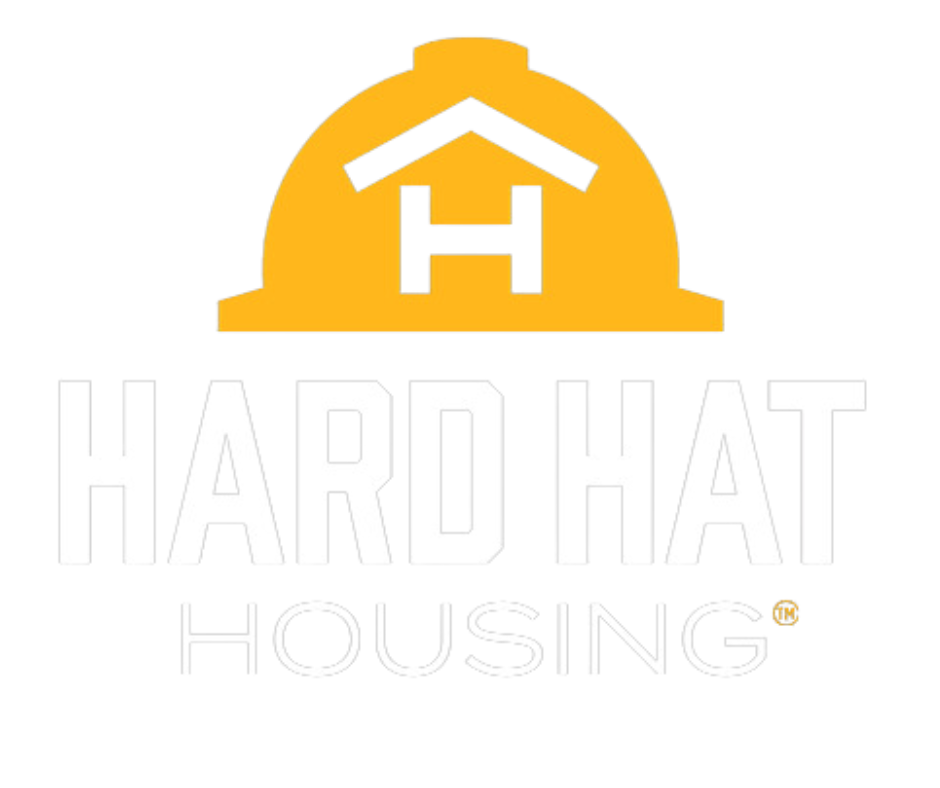 The logo for hard hat housing shows a hard hat with a house in the shape of an H on it.