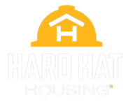 The logo for hard hat housing shows a hard hat with a house in the shape of an H on it.