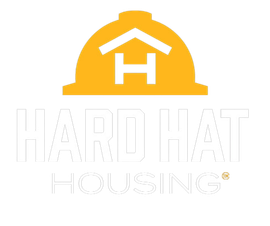 The logo for hard hat housing shows a hard hat with a house in the shape of an H on it.