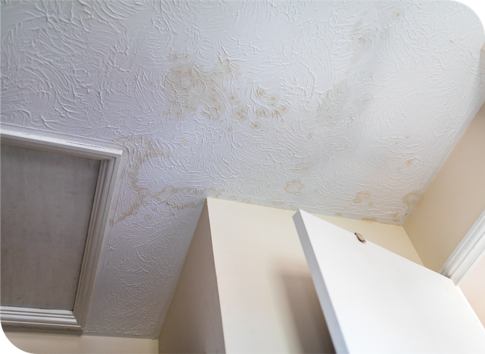 An attic with aluminum foil covering the ceiling