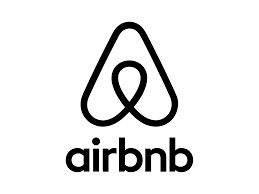 The airbnb logo is black and white on a white background.