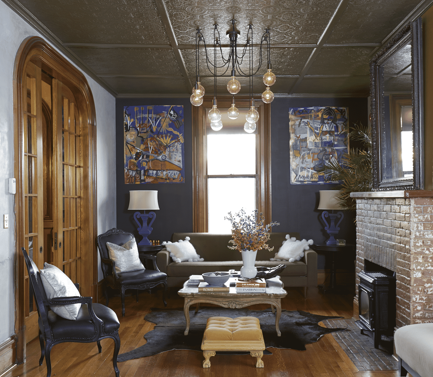 A living room with a fireplace and a couch