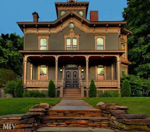 A large house with the number 204 on the front