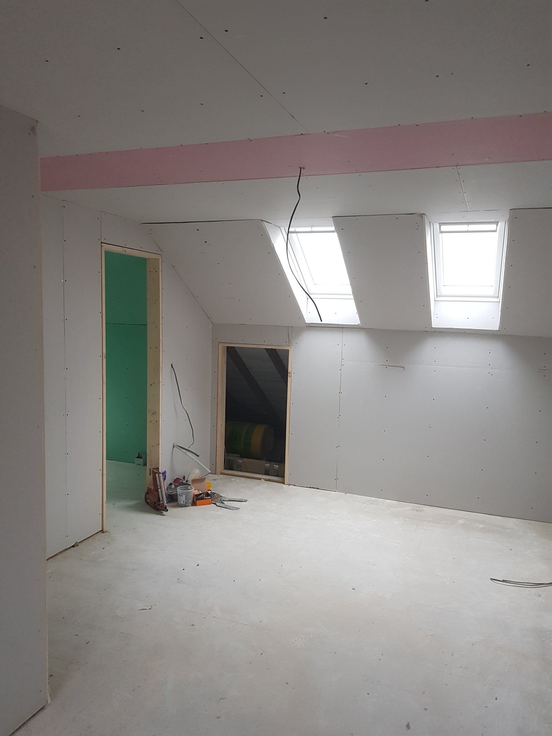 a stunning room with loft windows