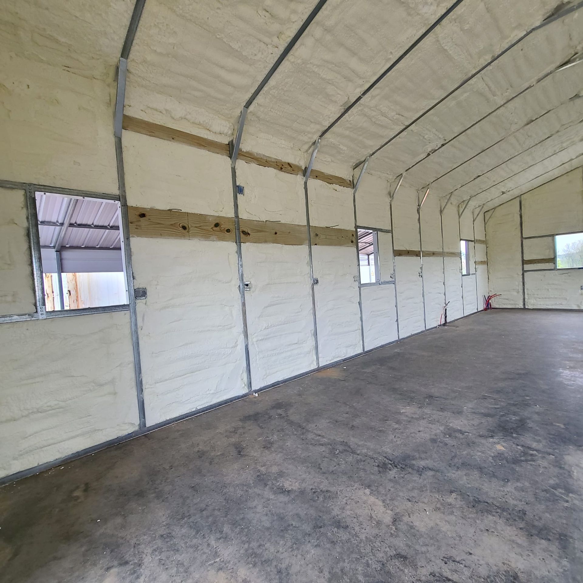 residential insulation services _ outside storage space spray foam insulation to keep outside spaces warm during the winter times 