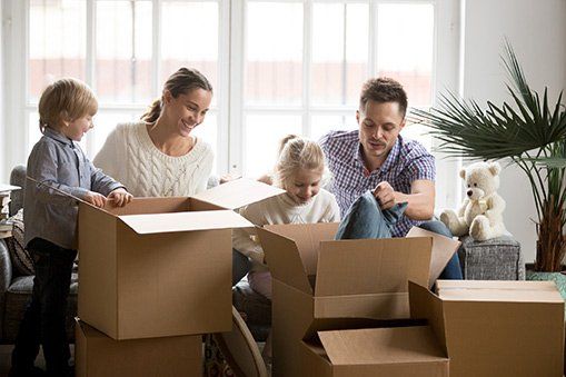 Family Packing Their Belongings