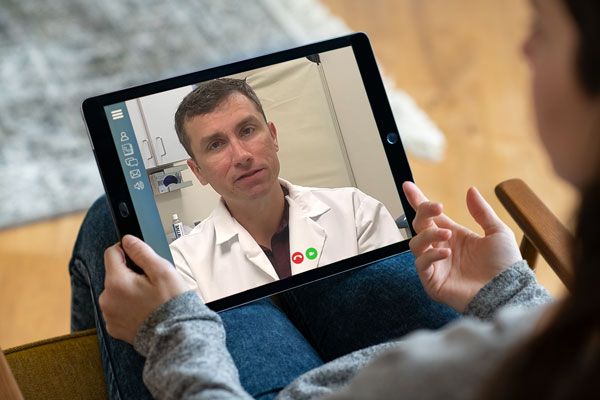 dr dan moore on a video chat