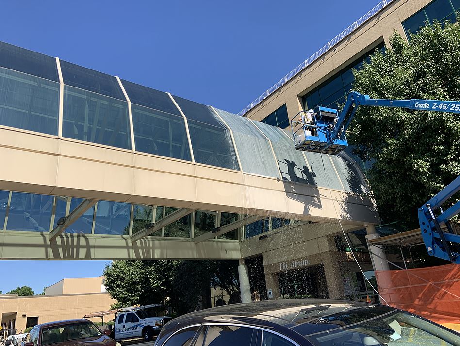 Commercial Cleaning: commercial power washing for glass walkway