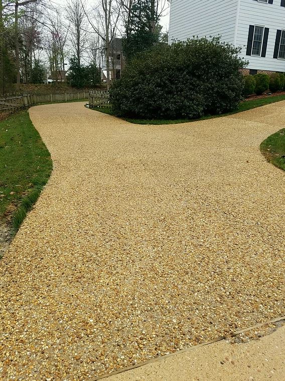 exposed aggregate concrete sidewalk after cleaning