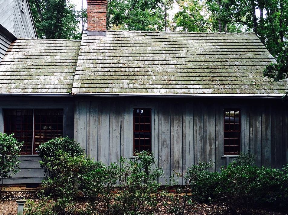 Roof of home before being pressure washed