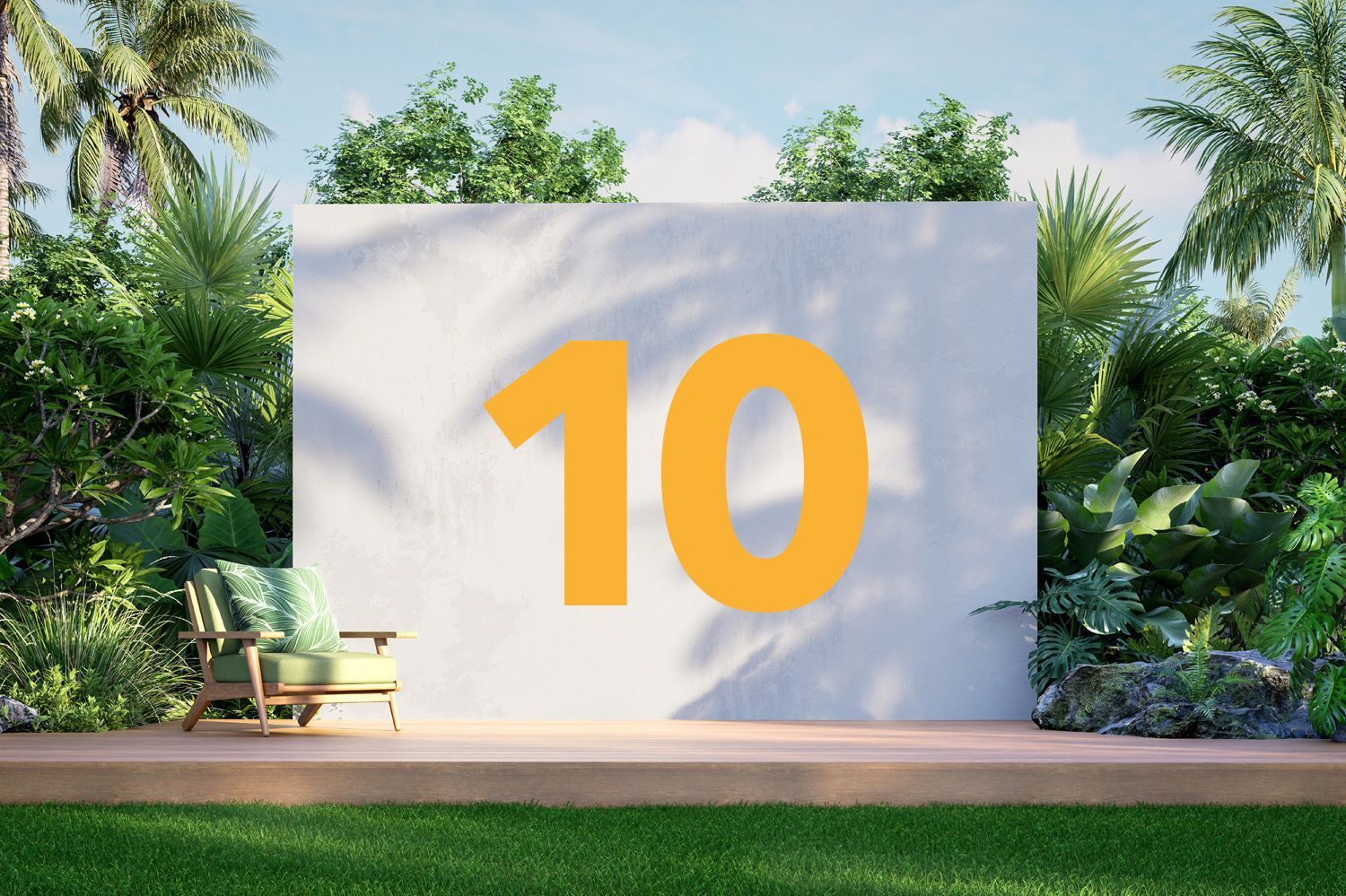Un mur blanc avec le numéro 10 en orange, situé dans un paysage luxuriant avec une chaise