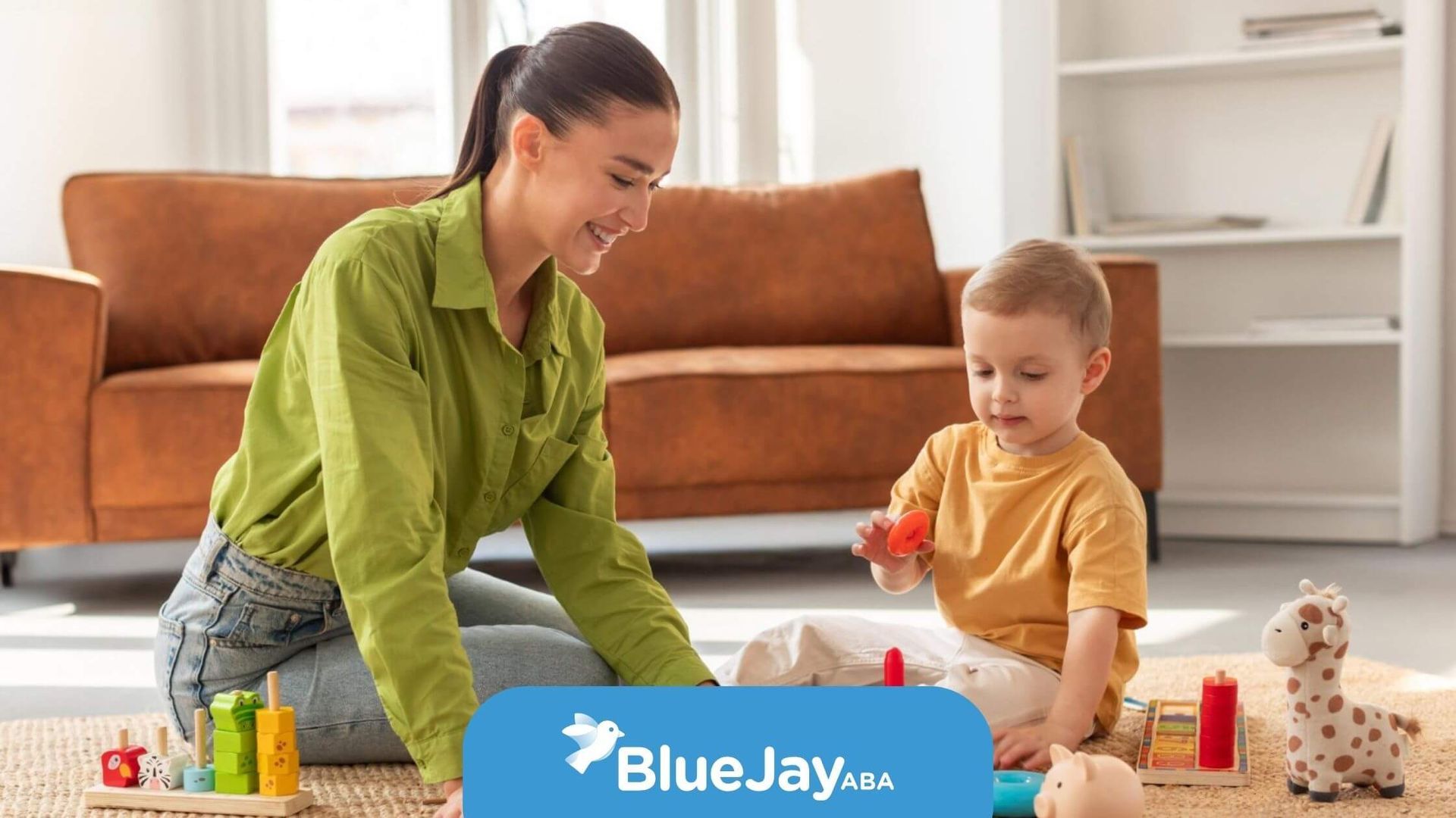 In-home ABA therapist teaching child through play.
